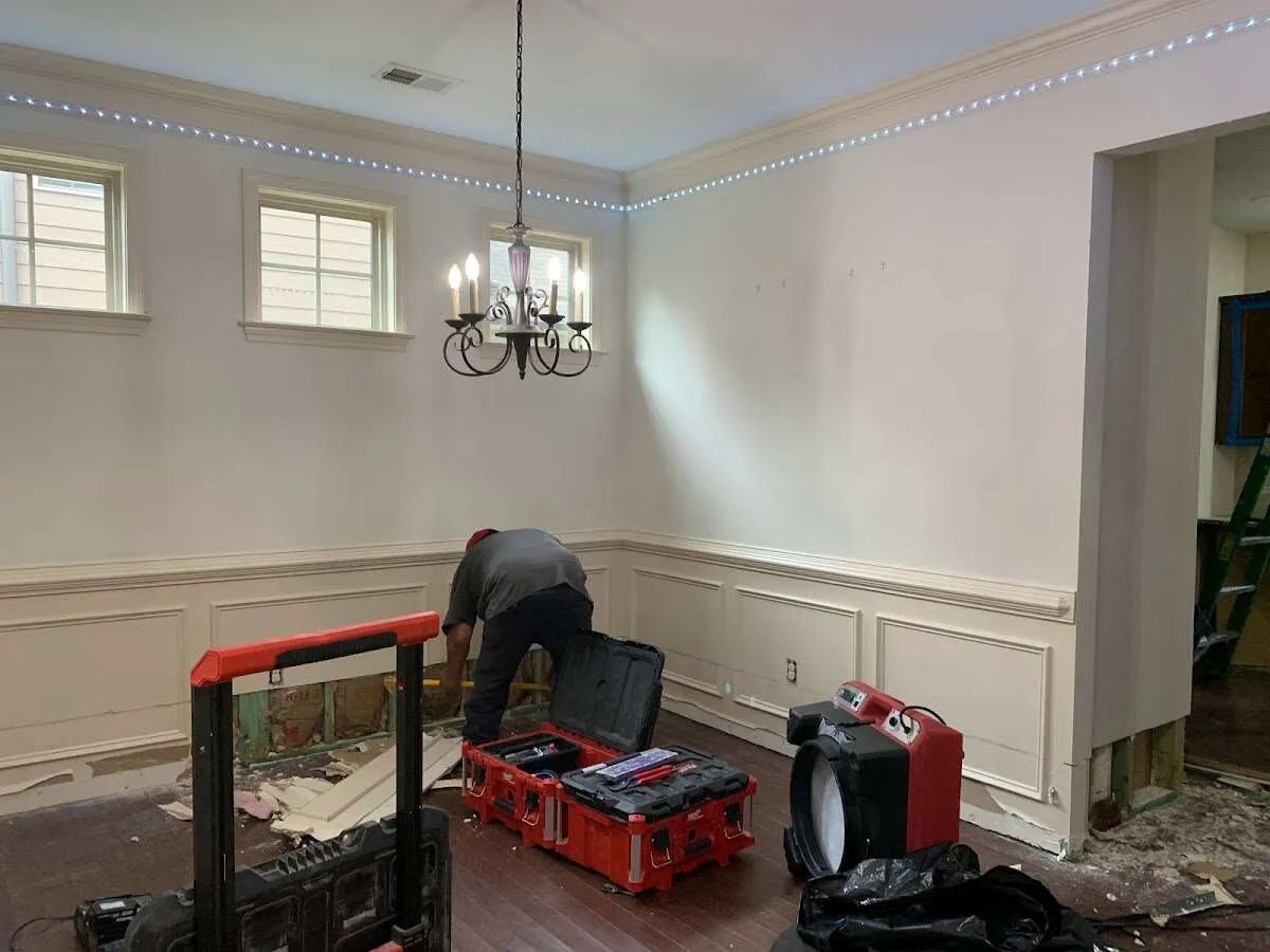 Restoration technician with professional equipment in Whitehall